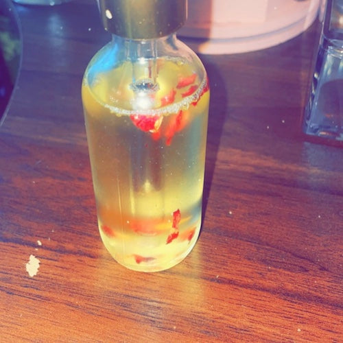 Small bottle actual sample of Island Peppa Skins Full Body Oil 