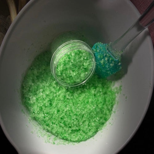 Island Peppa Peppermint Foot Scrub jar, exfoliating treatment for smooth and revitalized feet.