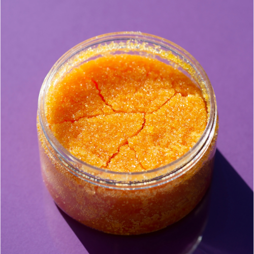 Jar of Sweet Turmeric Scrub for smooth, nourished, and glowing skin