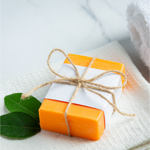 Stock photo of natural turmeric soap for brightening and soothing skin